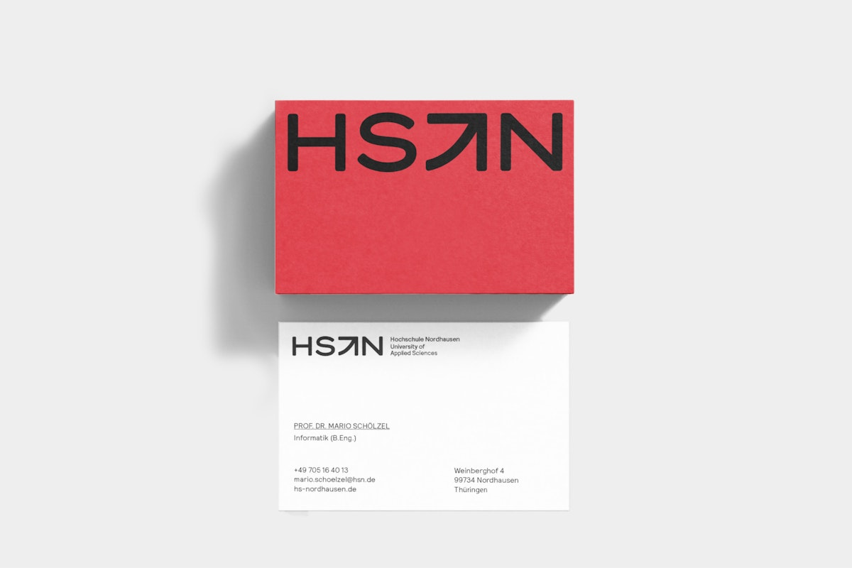 Mock-up of business-cards showing new visual identity for HSN.
